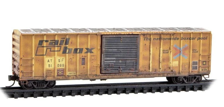 Micro Trains 025 44 446 50' Rib-Side Single-Door Boxcar No Roofwalk - Ready to Run -- Santa Fe #51088 (Weathered, Ex-Railbox, yellow, black, Series #10) N Scale