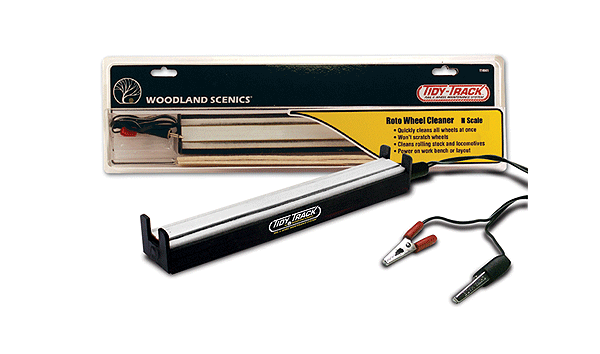 No more tedious wheel cleaning. Set your cars and locos in place and let Roto Wheel Cleaner do the work.
* Power from transformer or track * Includes replacement pads * Will not scratch wheels * Cleans all wheels at once