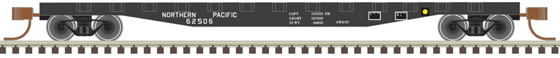 ATLAS Trainman 50005567 Flatcar w/Stakes - NP Northern Pacific 62552 (black, white) N Scale
