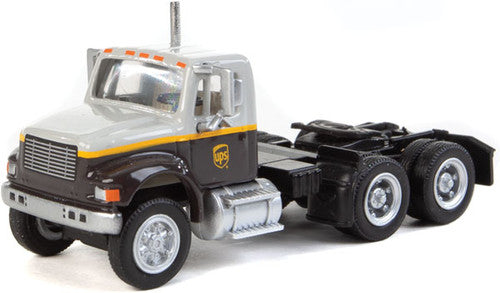 Walthers 949-11186 International 4900 Dual-Axle Semi Tractor Only UPS Freight (gray, gold, brown) - Assembled HO Scale SceneMaster